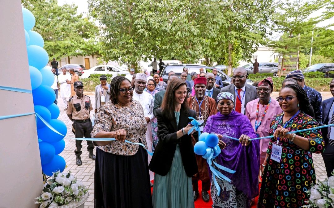 Official ribbon-cutting ceremony at an IMILI inauguration event in Abuja